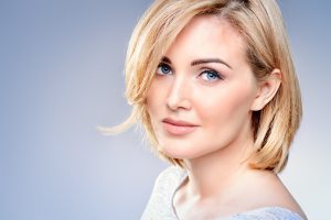 Blond Model with Thick Face and Blue Eyes Facelift Surgery Dallas