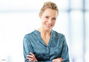 Smiling Blond Female with Satin Blouse