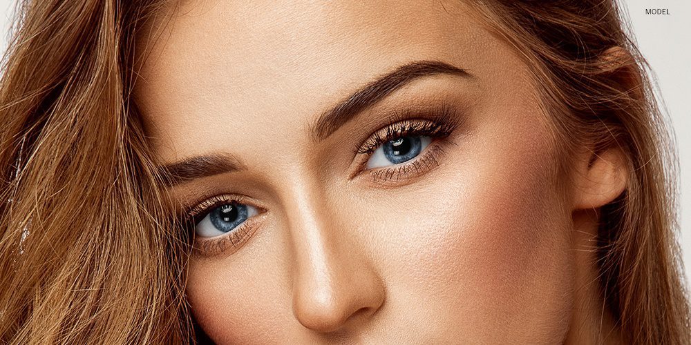 Bronzed Model with Blue Eyes Close Up Bronzed Model with Blue Eyes Close Up